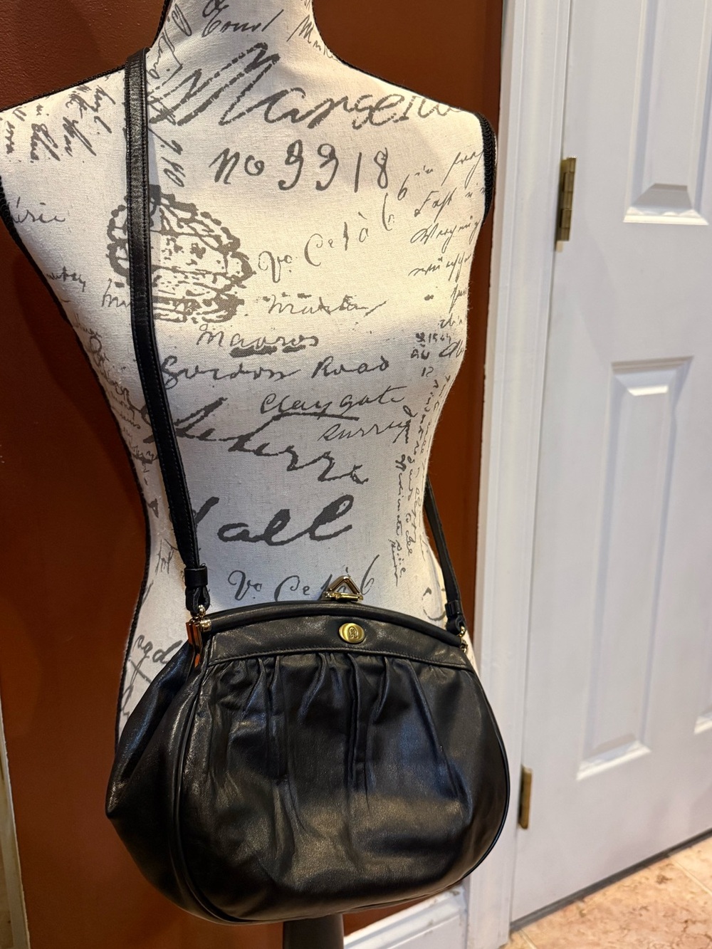 Etienne Aigner Black Leather Pleated Crossbody with mirror.